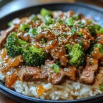 Sizzling Beef & Broccoli Delight is not just a dish; it's an experience that tantalizes the taste buds and warms the heart. This classic recipe combines tender strips of beef with crisp broccoli florets, all enveloped in a savory sauce that brings together a medley of flavors. What makes this dish particularly appealing is its perfect balance of protein, vegetables, and carbohydrates, making it a wholesome meal option for families and individuals alike. Whether served over a bed of fluffy jasmine rice or enjoyed on its own, Sizzling Beef & Broccoli offers a satisfying and nutritious dining experience.
